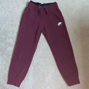 Maroon Nike joggers